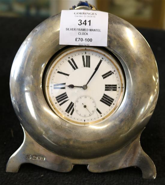 Silver framed mantel clock